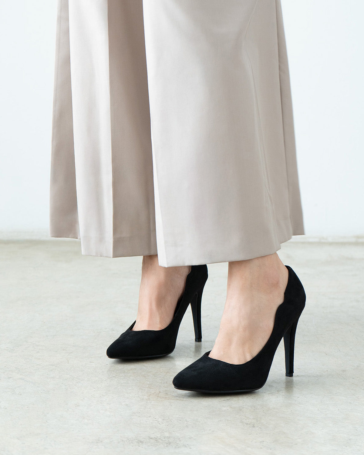 Black faux suede pointed toe pump