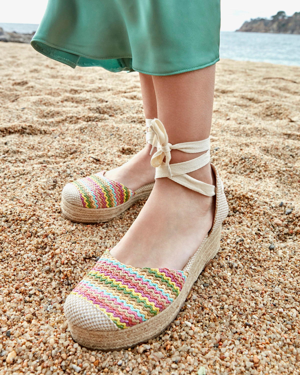 Black fabric sandal with jute wedge