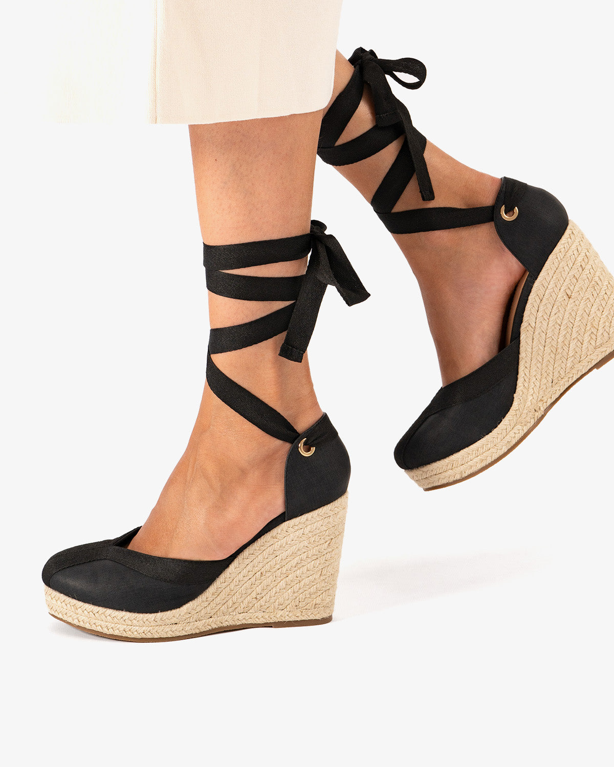Black fabric sandal with jute wedge