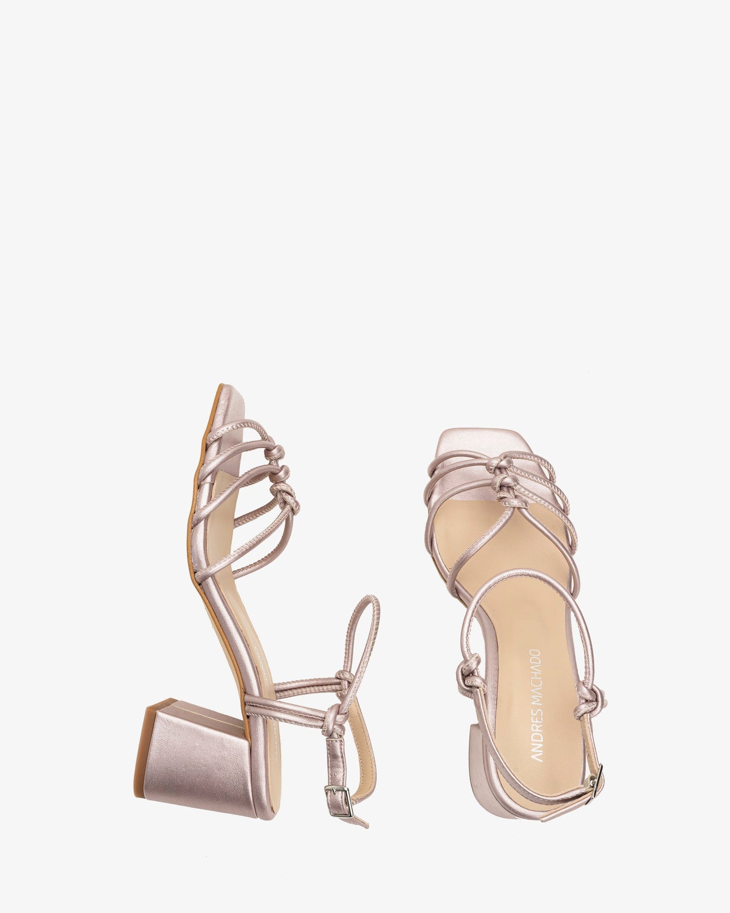 Metallic pink leather knotted sandals