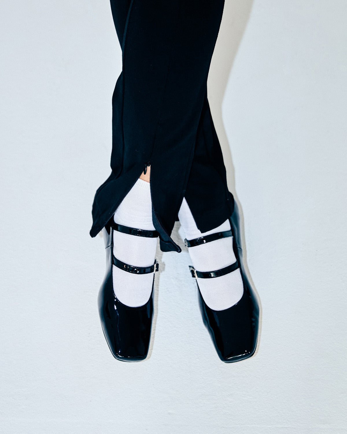 Bailarina plana en charol negro