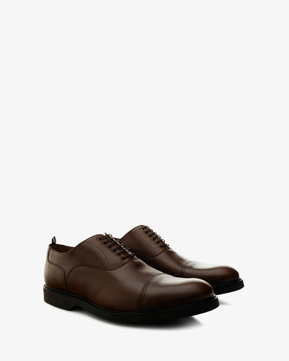 Zapatos estilo oxford en cuero de color marron