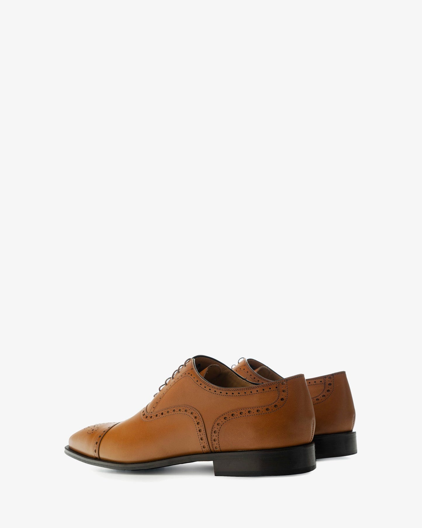 Leather Oxford-style shoes in a tan color