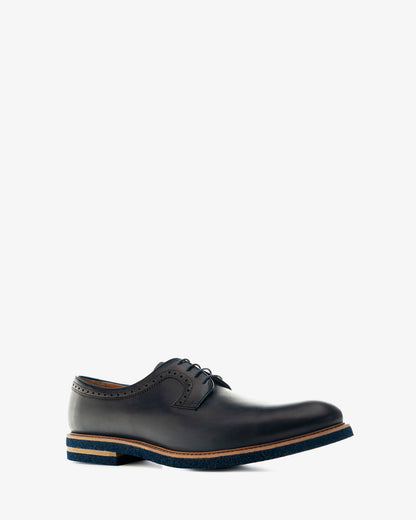 Oxford-style shoe in navy blue leather