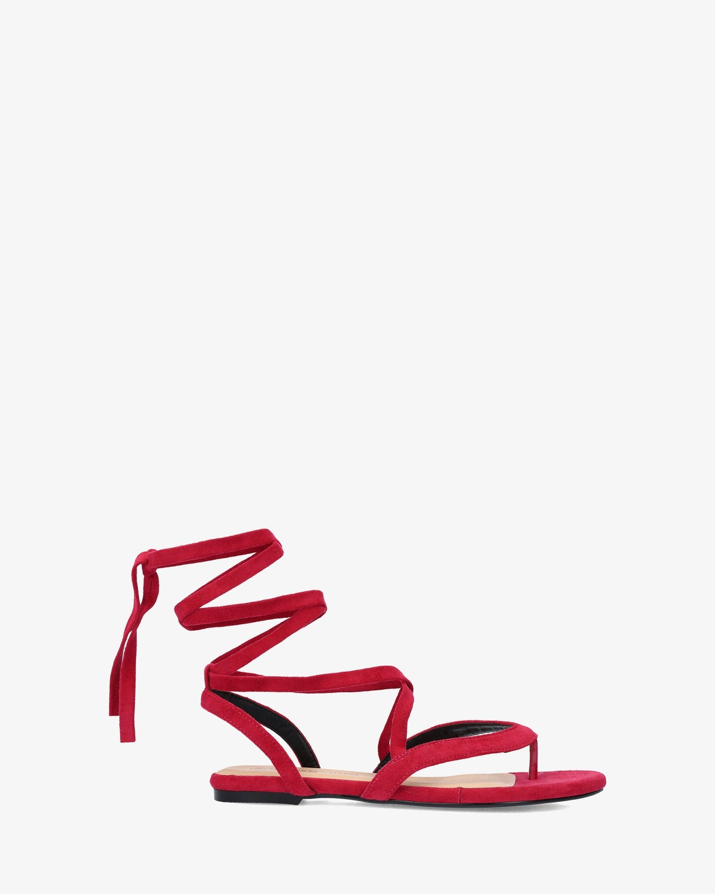 Sandalia plana en símil ante color fucsia