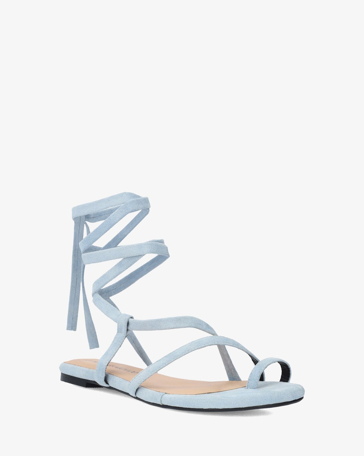 Sandalia plana en símil ante color celeste