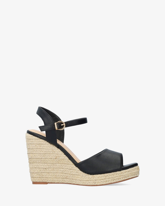Sandalia en soft negro con cuña en yute
