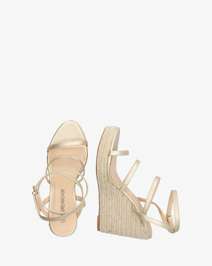 Sandalia en soft oro con cuña en yute