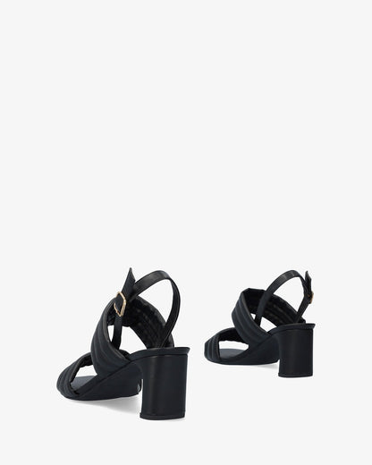 Soft black sandal with a semi-square heel