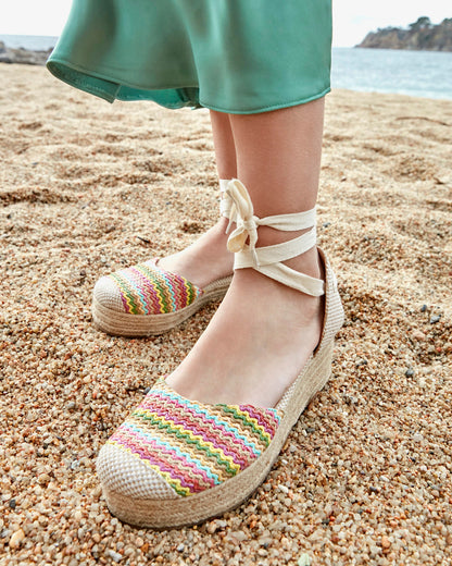 Black fabric sandal with jute wedge