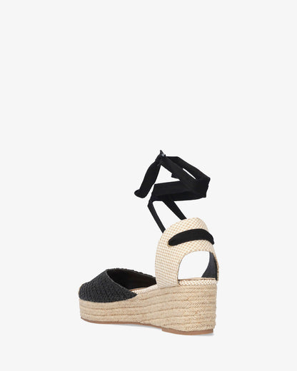 Black fabric sandal with jute wedge