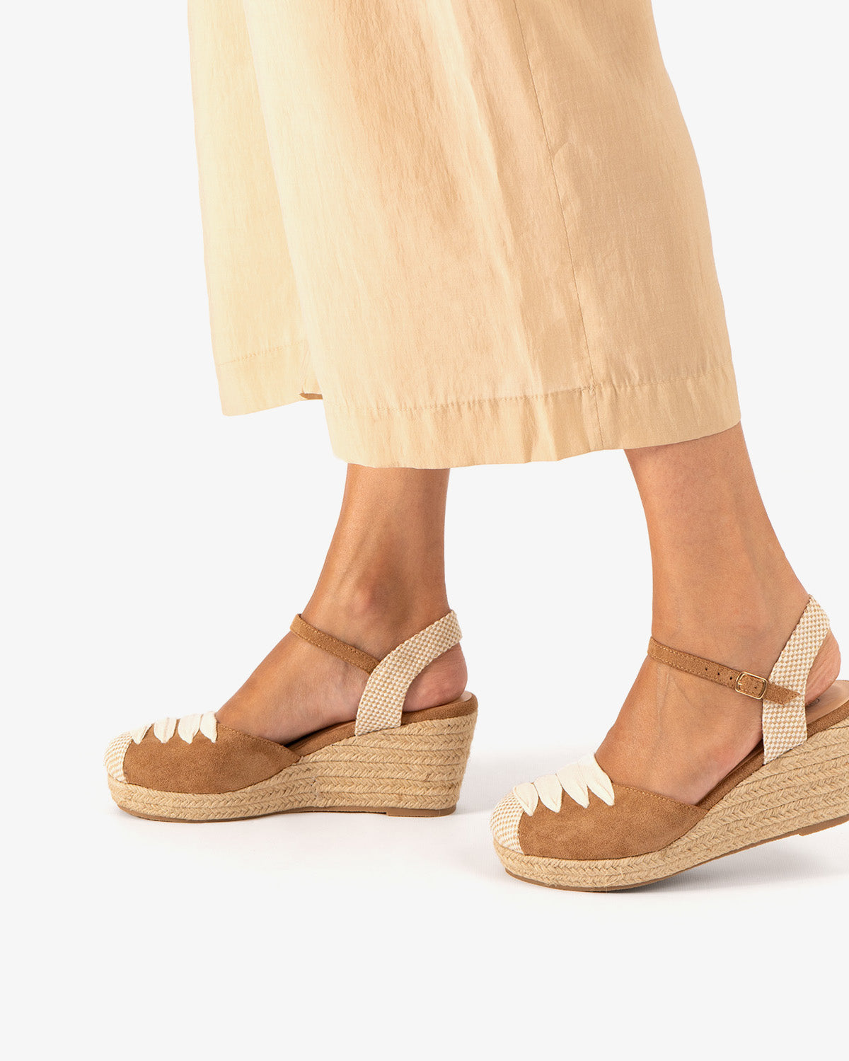 Camel-colored faux suede sandal with jute wedge