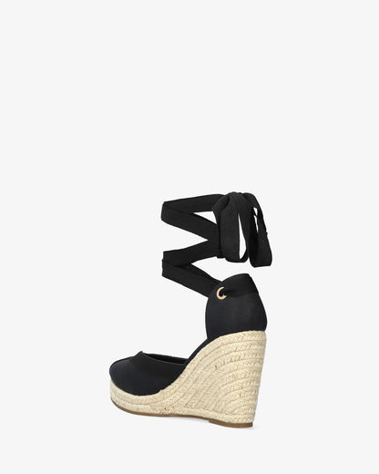 Black fabric sandal with jute wedge