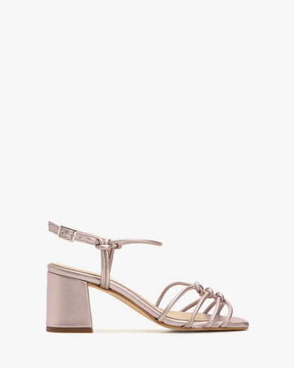 Metallic pink leather knotted sandals