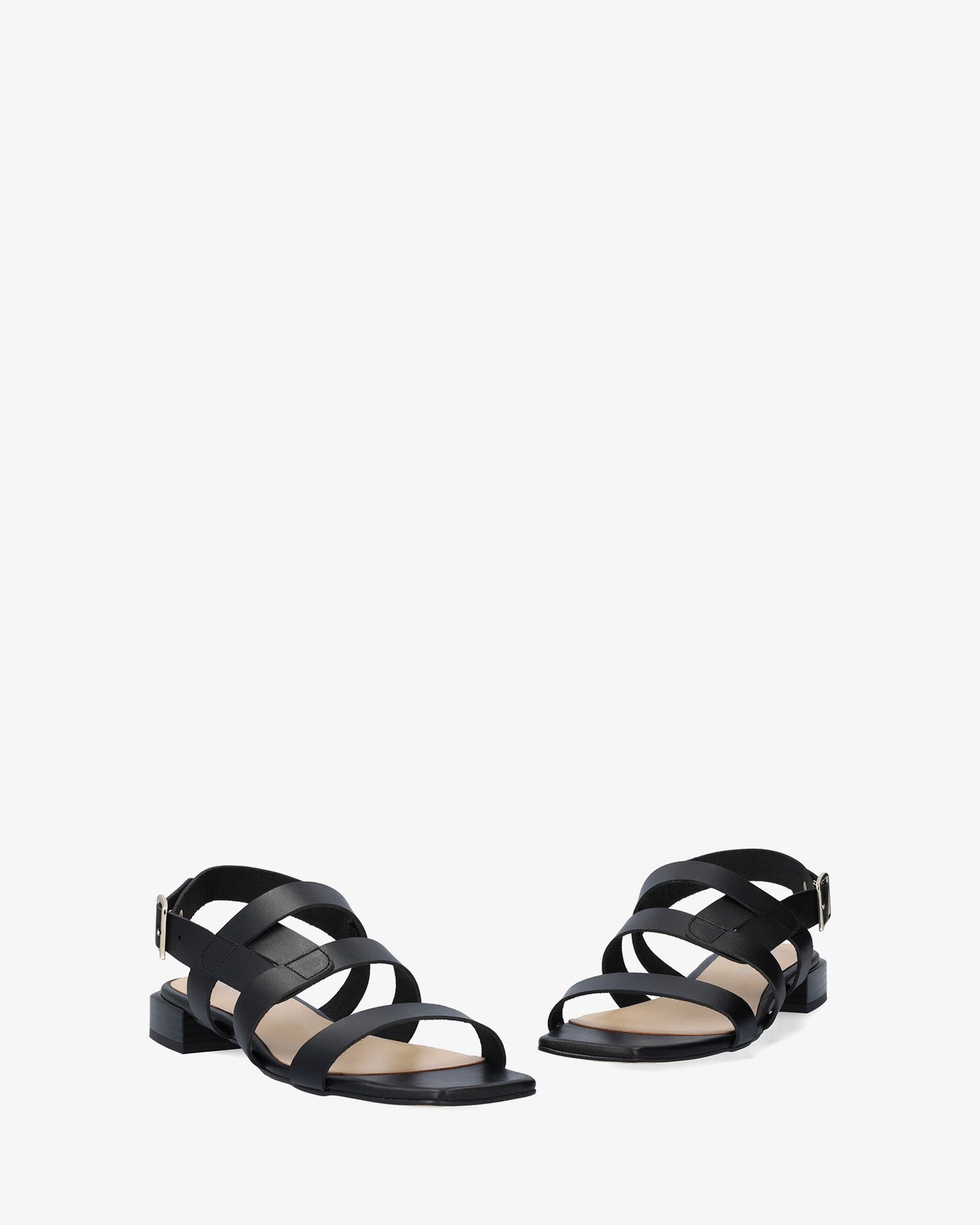 Flat sandal in black leather