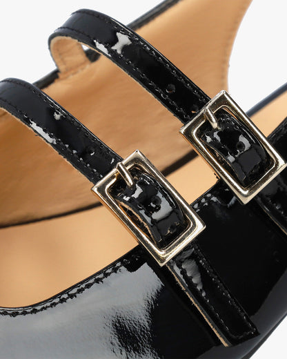 Black patent leather ballerina flats with heels