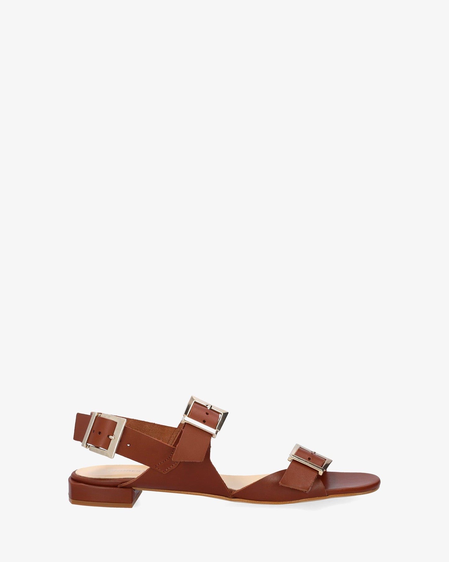 Flat sandal in brown leather