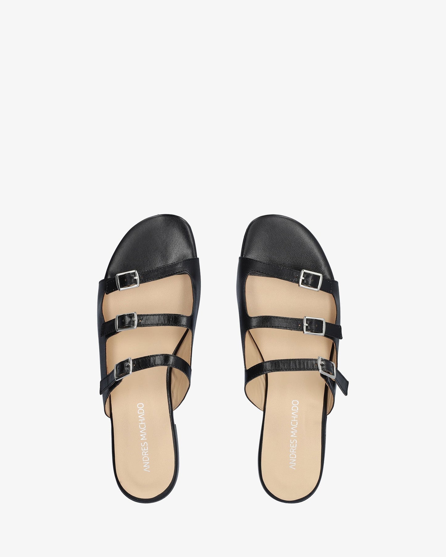 Flat sandal in black leather
